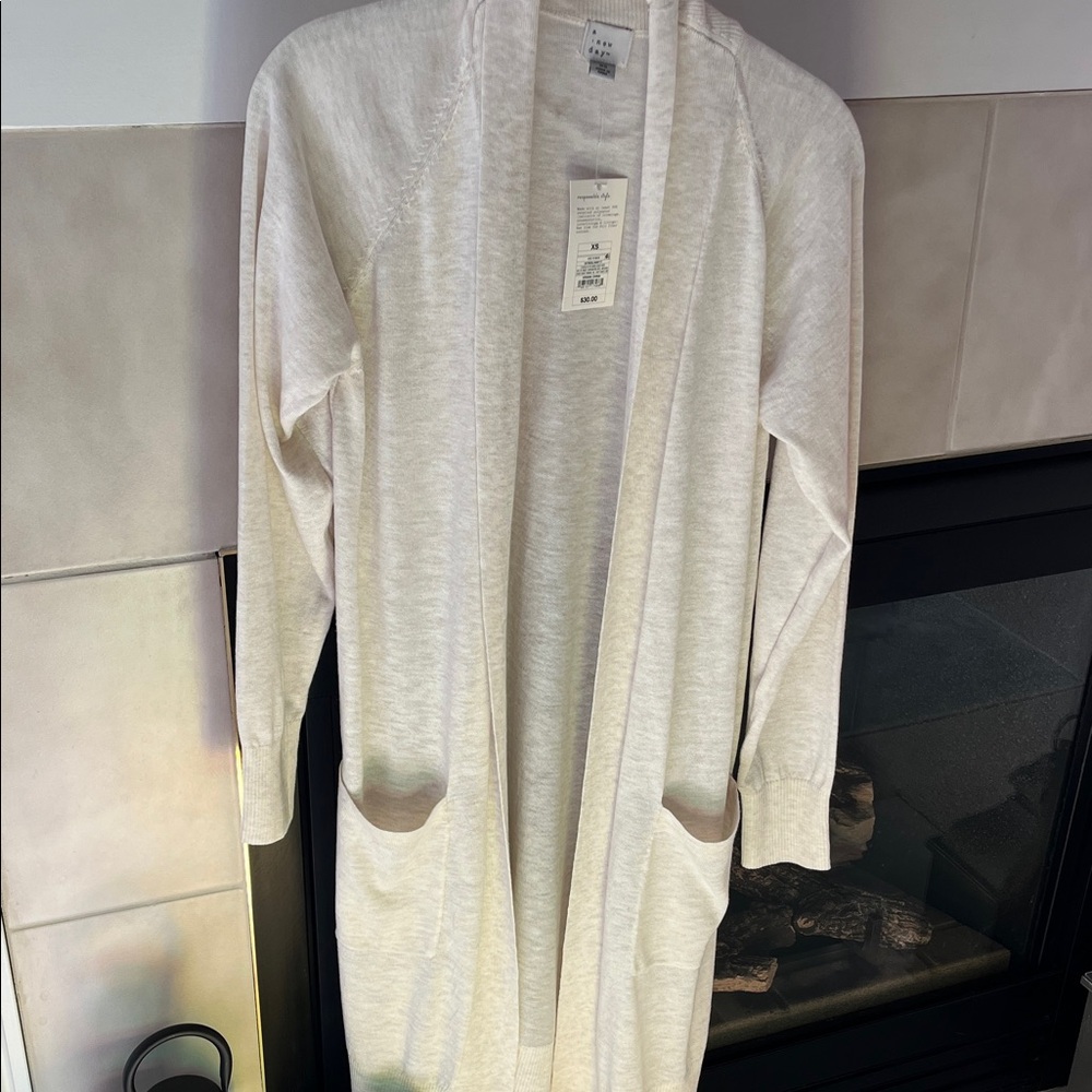 NWT cream color open front long sweater

Buy one item, second item is free